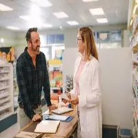 Pharmacist Helping Customer.
